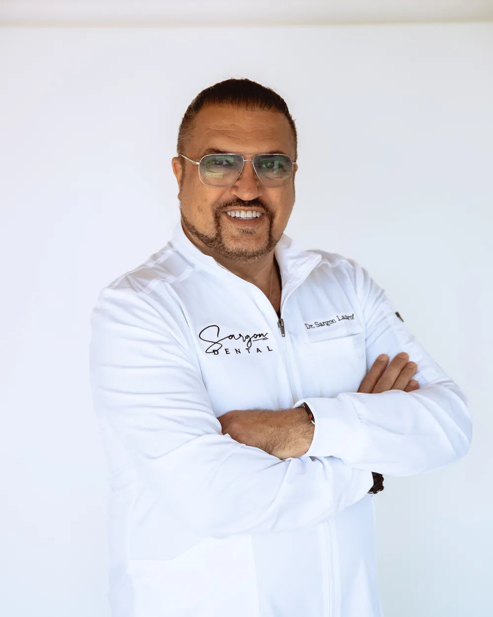 Dr. Sargon Lazarof in clinical dress